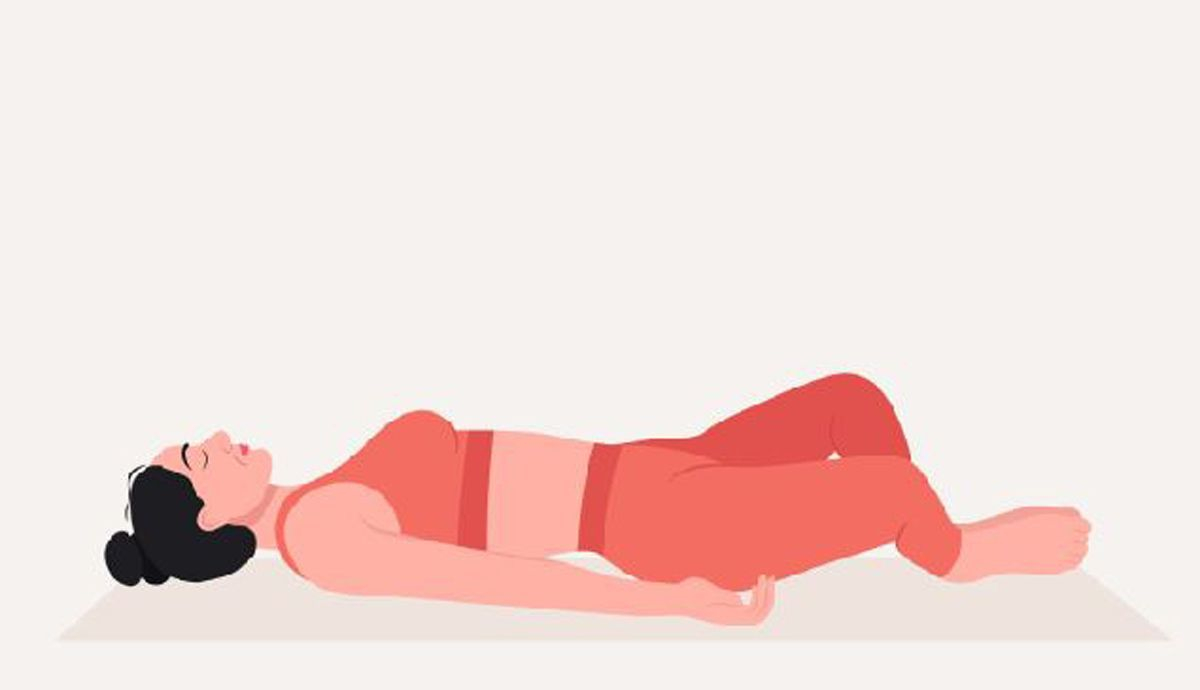 Postura de la Mariposa Tumbada Yoga para la menstruación Postura de la Mariposa Tumbada Yoga para la menstruación